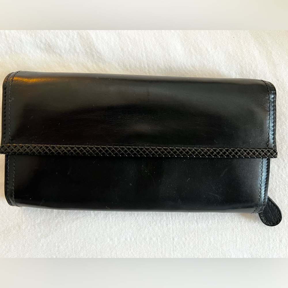 Black leather Bottega Veneta wallet.